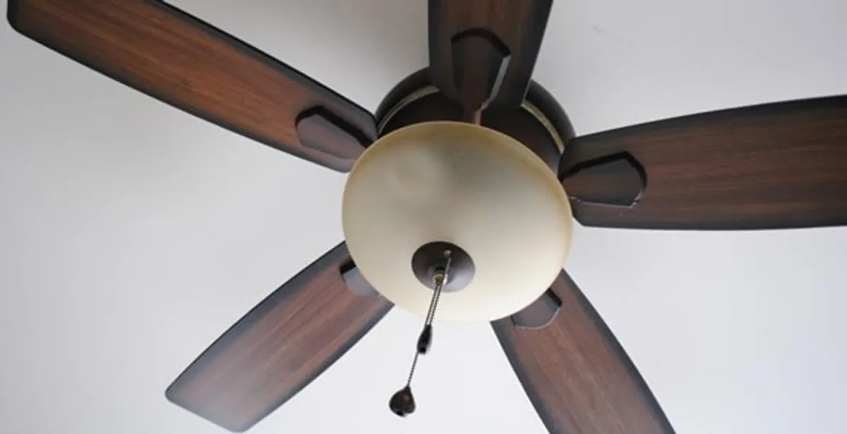 Fully installed ceiling fan with balanced blades and light fixture in Bloomington, IN