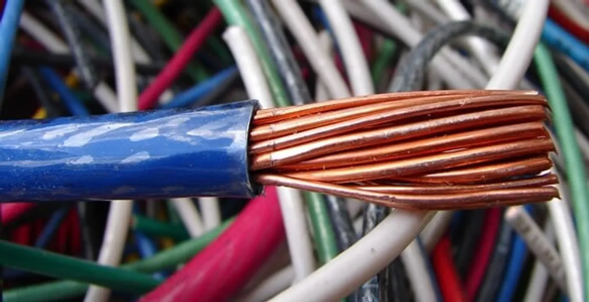 electrical wiring services showing exposed copper conductors and cable preparation in Bloomington, IN
