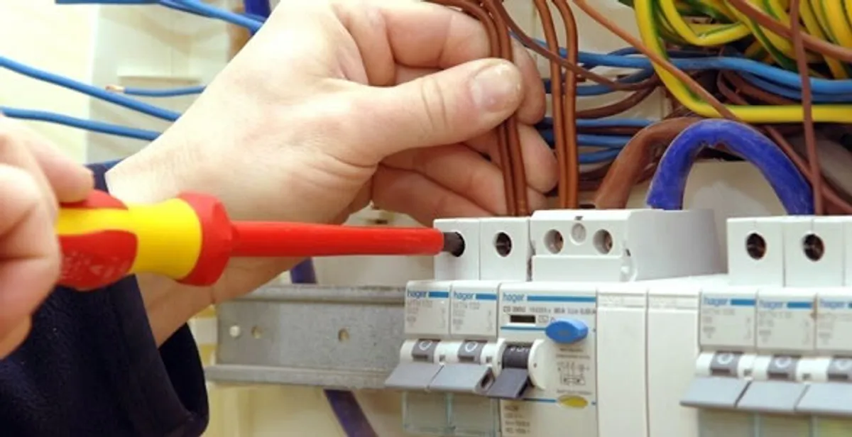 electrician services performing professional electrical panel wiring and connections in Bloomington, IN