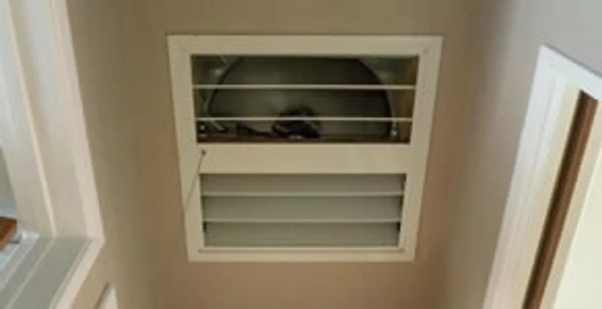 whole house fan installation services with ceiling-mounted ventilation system in Bloomington, IN